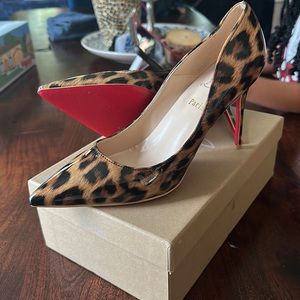 Louboutin animal print pumps